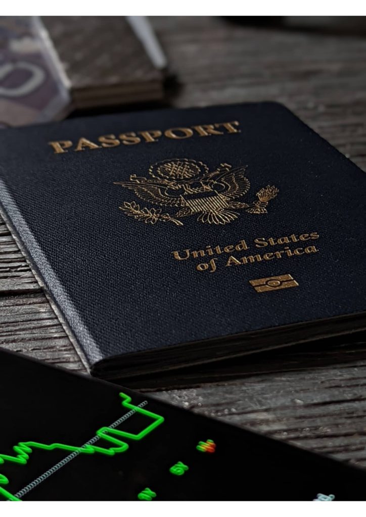 Close-up of a US visa stamp showing the red 8-digit US visa number on a Nigerian passport